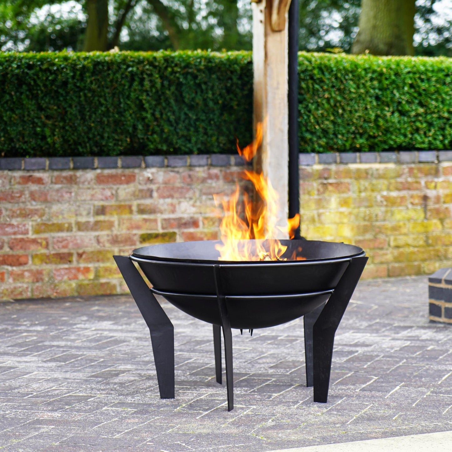Metal Kendal Outdoor Fire Pit on Stand in Black by Ivyline
