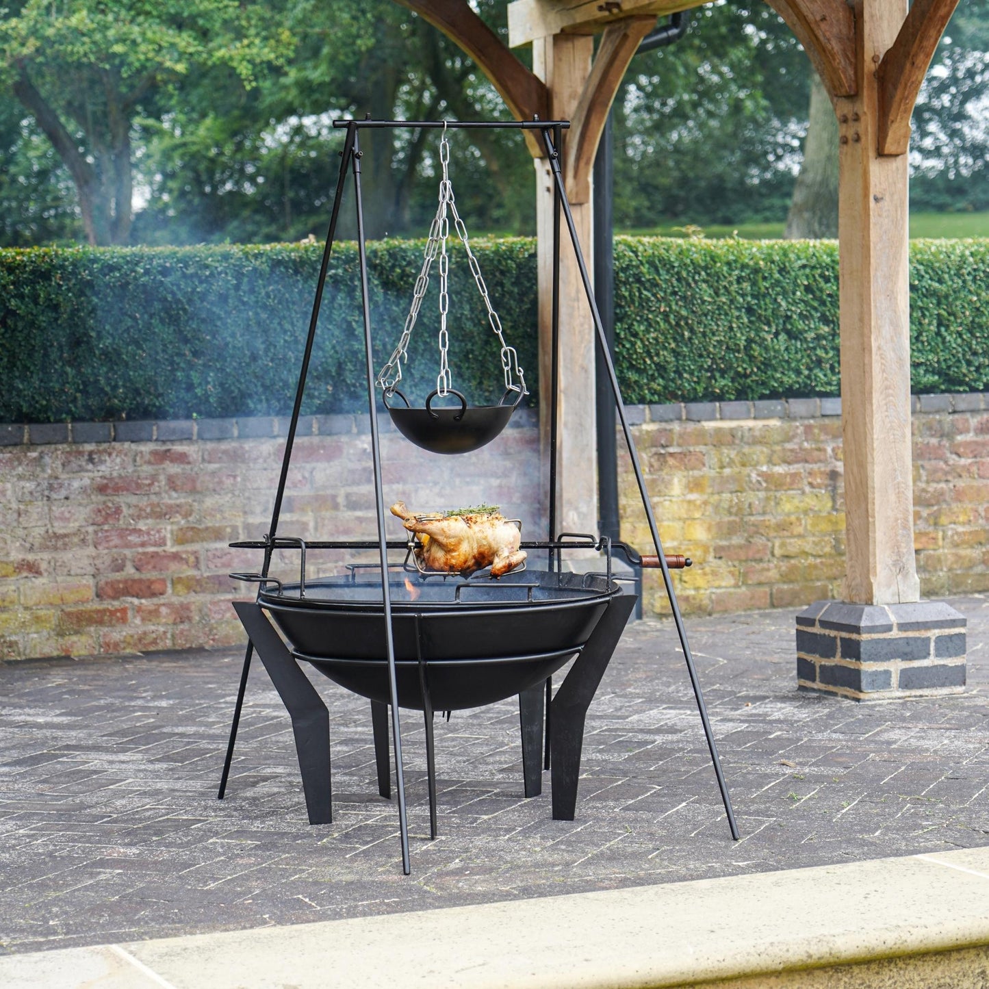 Metal Kendal Outdoor Fire Pit on Stand in Black by Ivyline